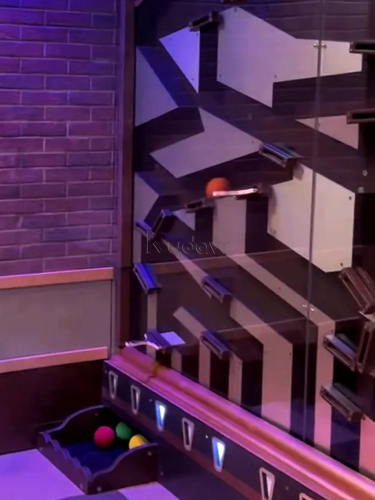 Game room interactive falling balls tube wall
