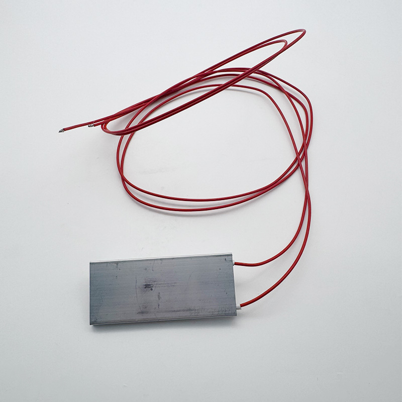 The heating plate submerged in an aquarium, safely operating and maintaining a stable 60&deg;C water temperature.