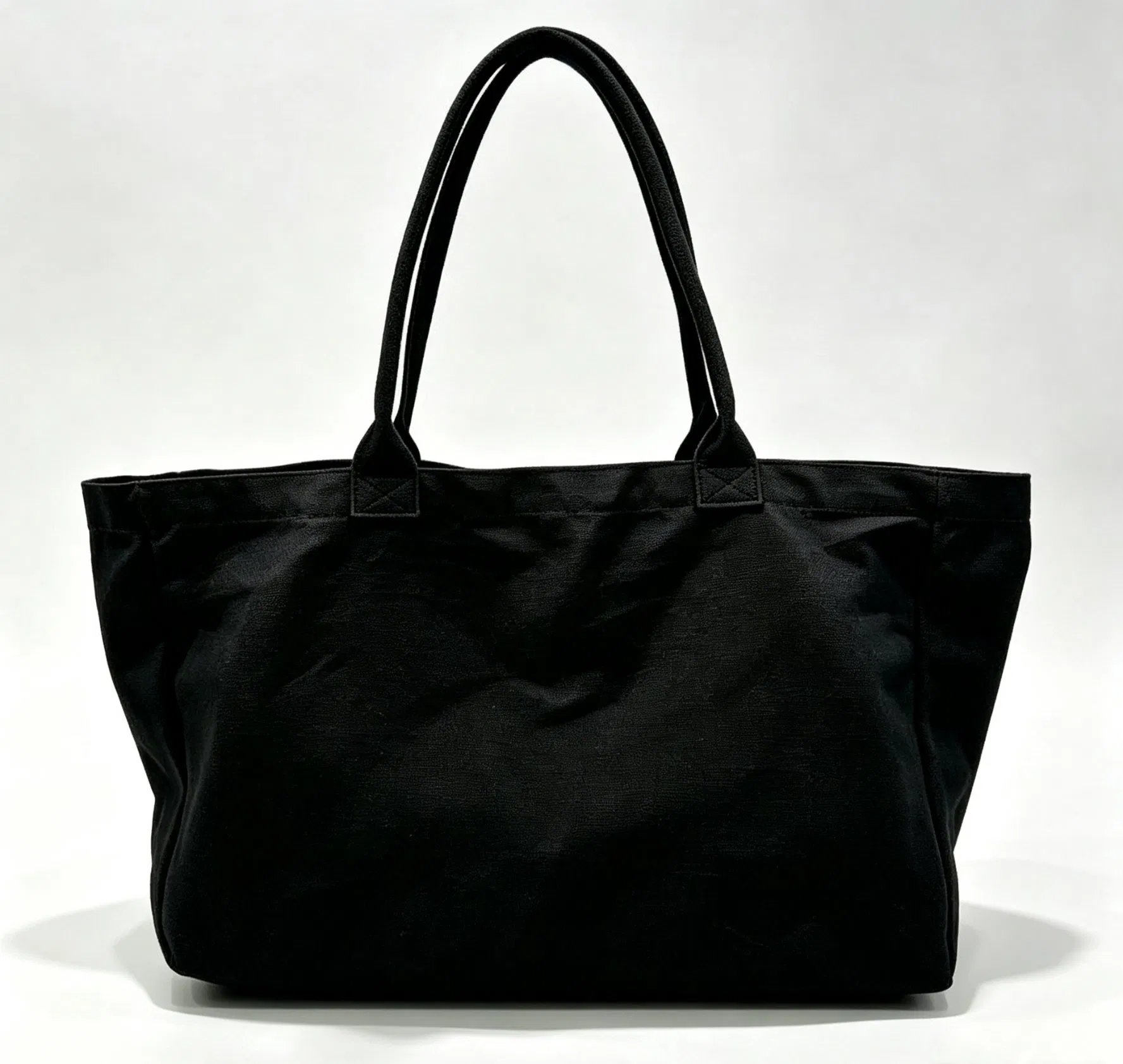 Unbranded black canvas shopping bag with wide handles
