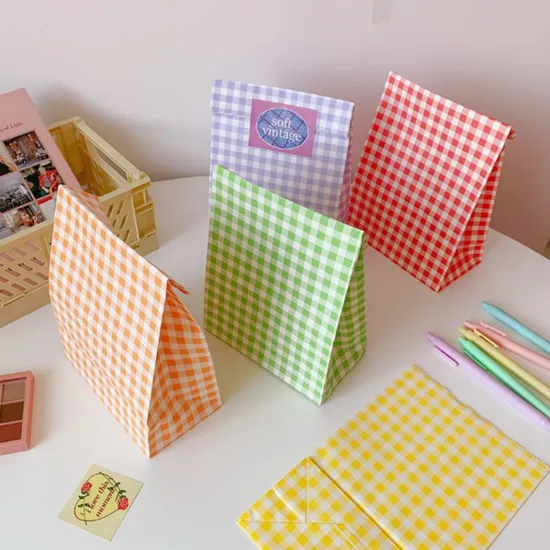 Plaid paper bag colorways arranged as a retail campaign version example
