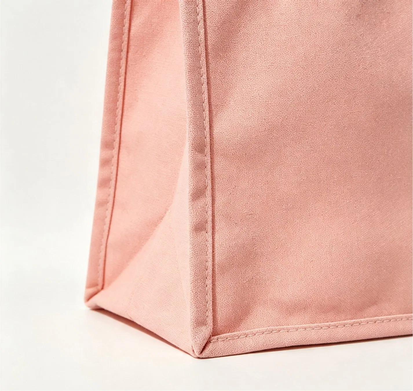 Pink shopping bag gusset and side-panel construction detail