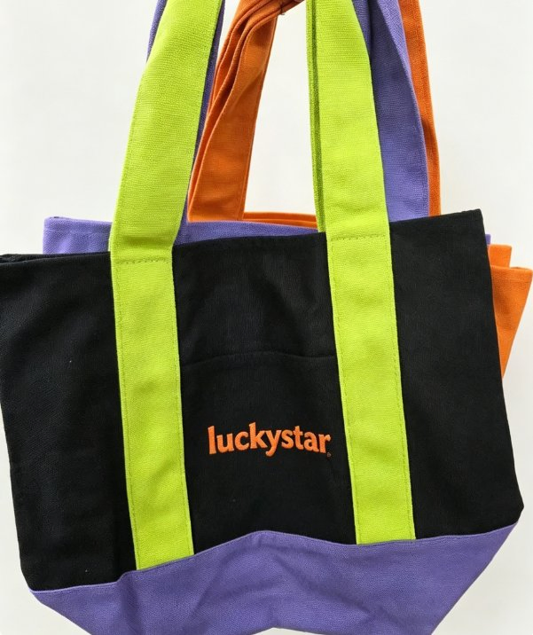 Several LUCKYSTAR-branded shopping bag color and construction variations