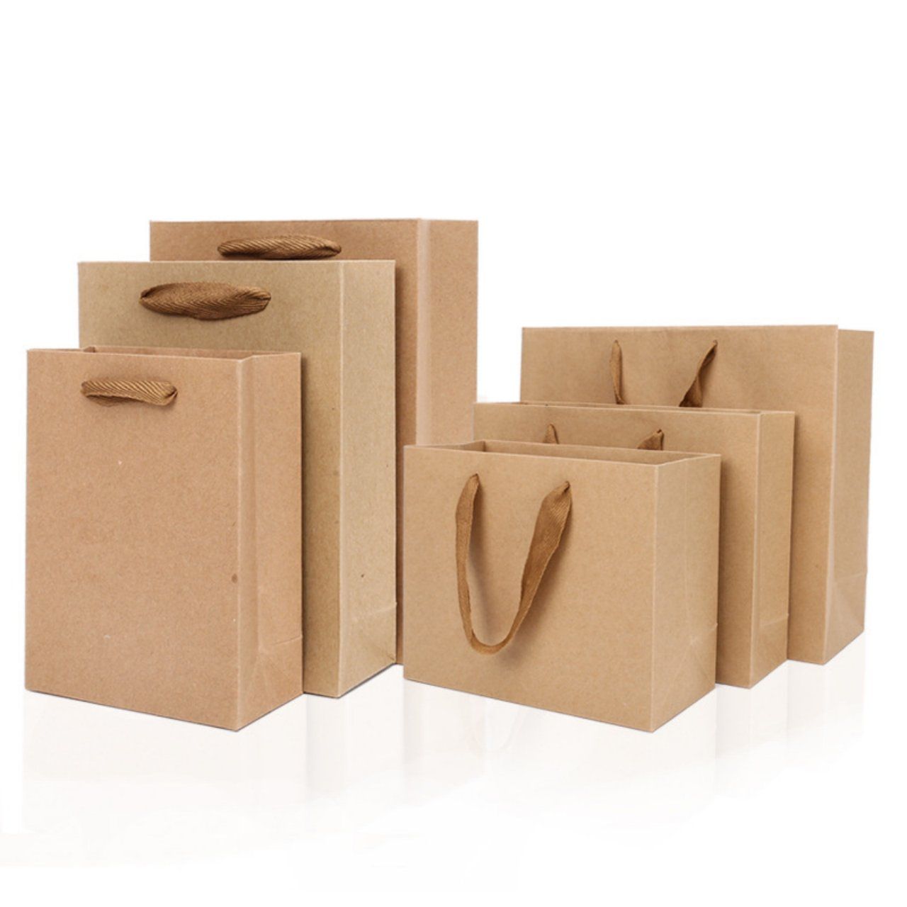 Plain kraft paper shopping bags in several sizes