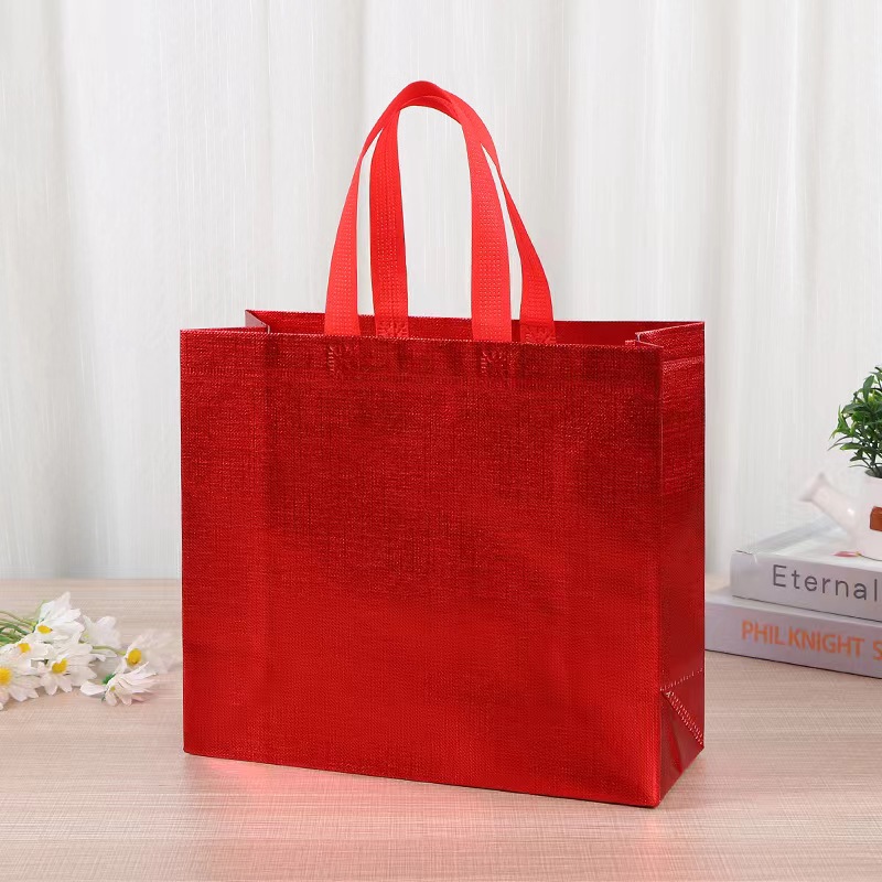 Red laminated non-woven polypropylene shopping bag with gusset and short handles