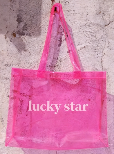 Flat pink LUCKYSTAR PVC shopping bag showing gusset and handle geometry