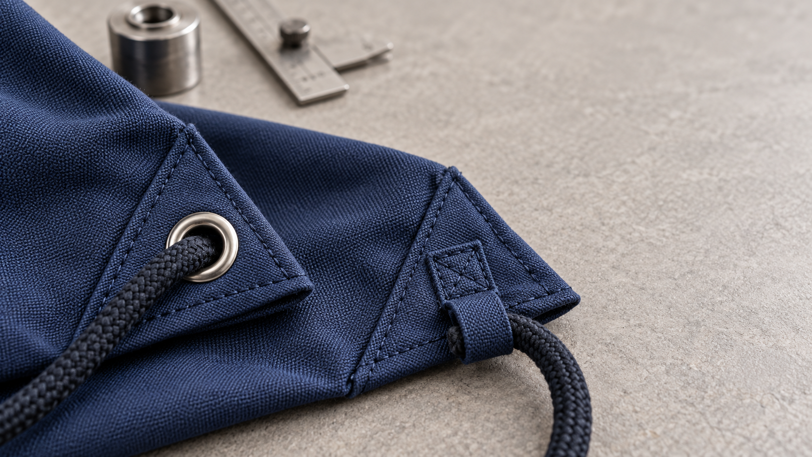 Metal eyelet and reinforced fabric corners