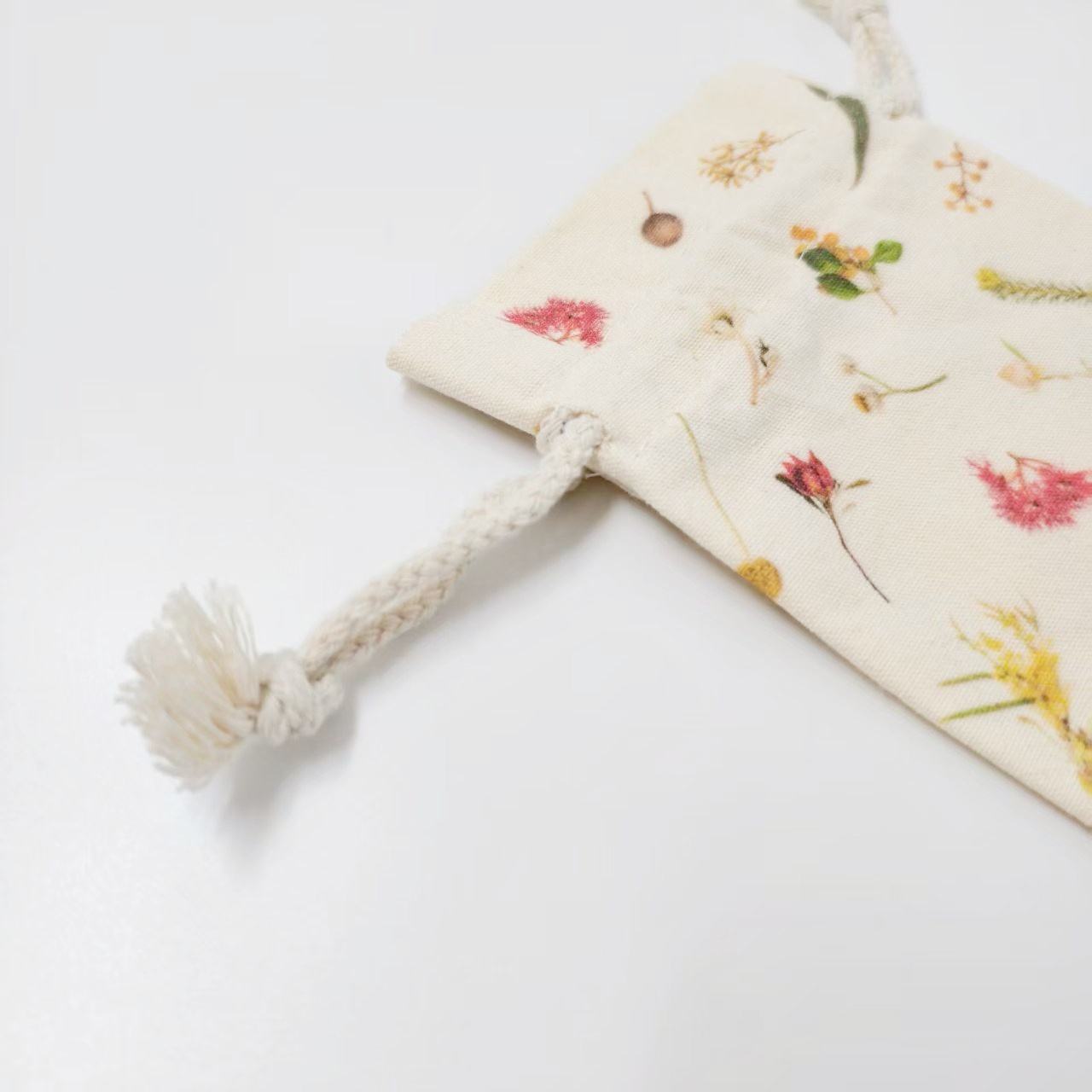 Drawstring pouch cord and printed fabric detail